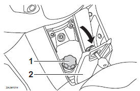 To open the fuel tank cap