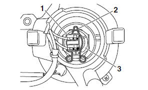 To replace a low beam headlight bulb