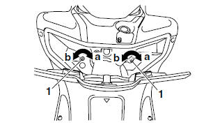 To replace a low beam headlight bulb