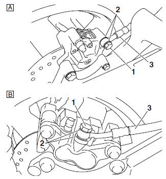 Removing the rear brake caliper