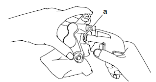 Disassembling the rear brake caliper (YP250R only)